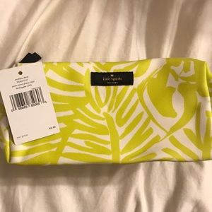 Green and white Kate Spade makeup case